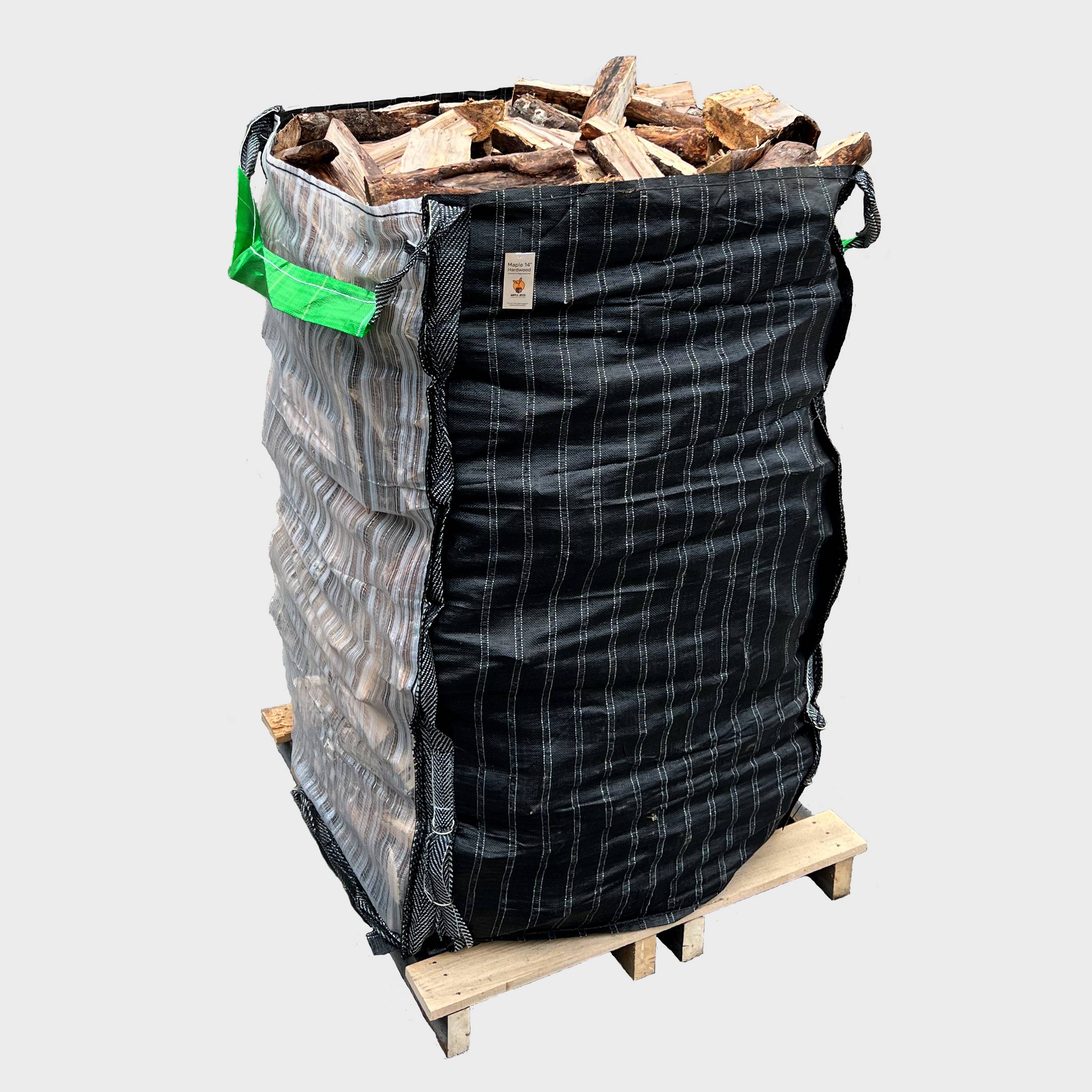 a big bag filled with split firewood sitting on a pallet